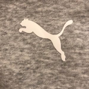 A grey puma hoodie.